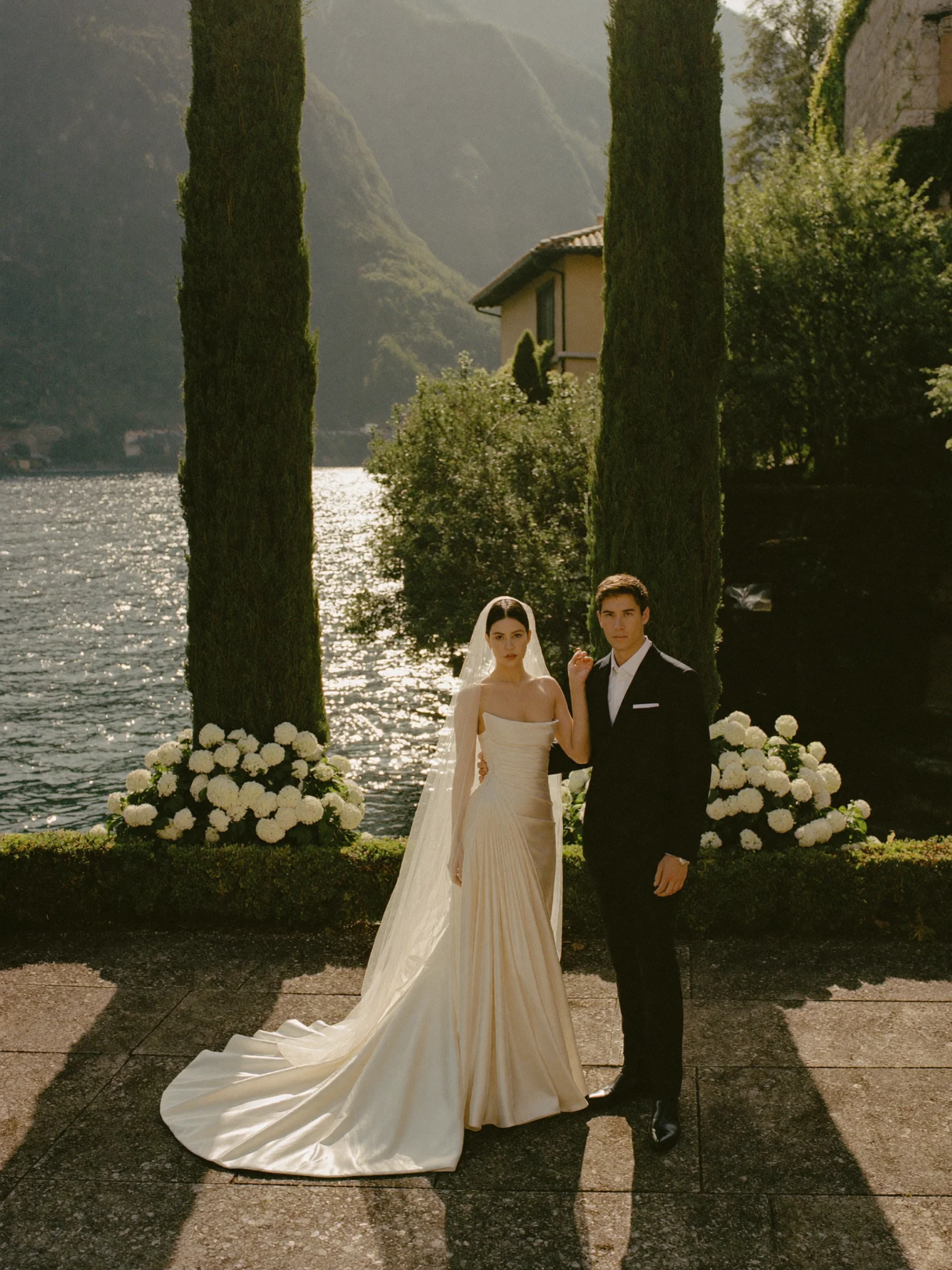 A quiet newlywed moment in an Italian garden